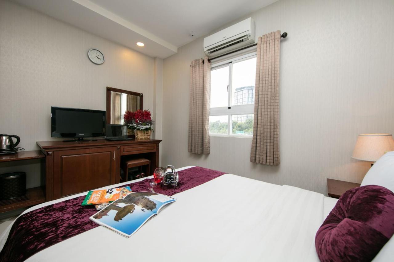 Quy Hung Hotel Central Cidade de Ho Chi Minh Exterior foto